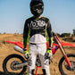 Motocross-Hose Acid Camo getragen auf der Strecke